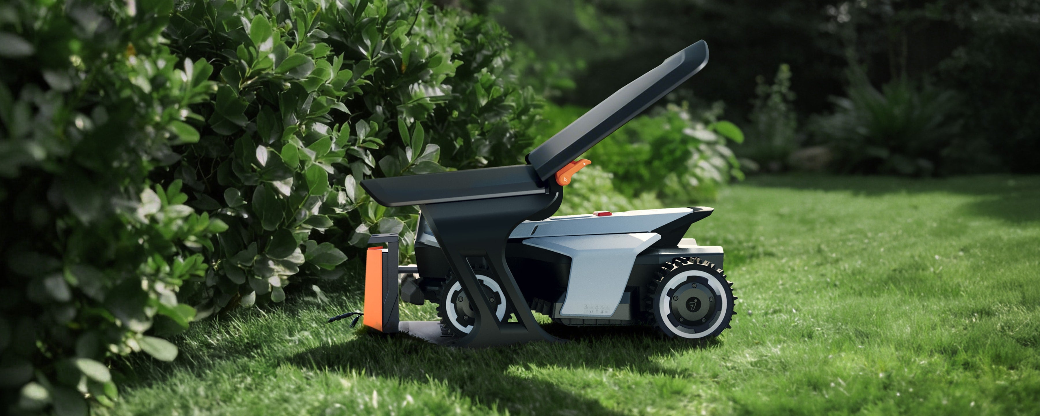 Segway Navimow i105E robot lawn mower on a green lawn.
